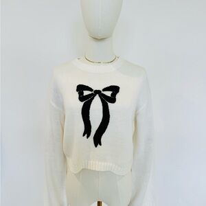 Elegant White Sweater with Black Bow